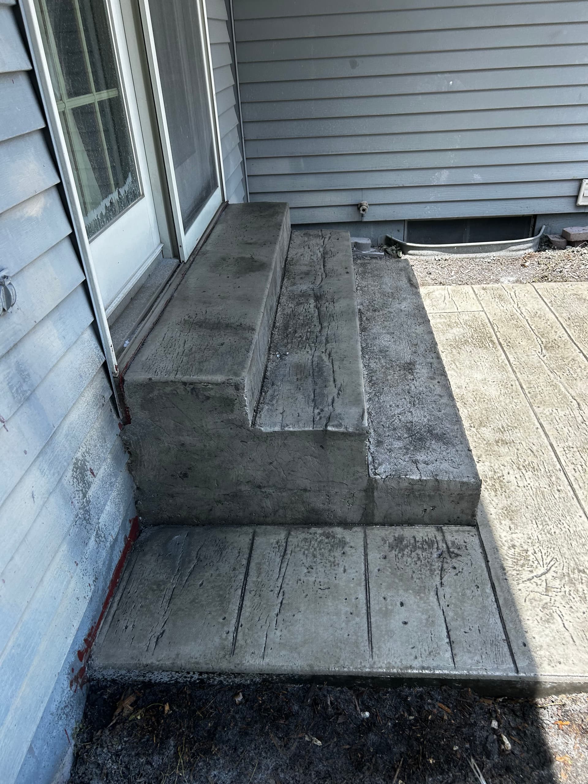 Stamped Concrete Patio with Steps in Washington Iowa